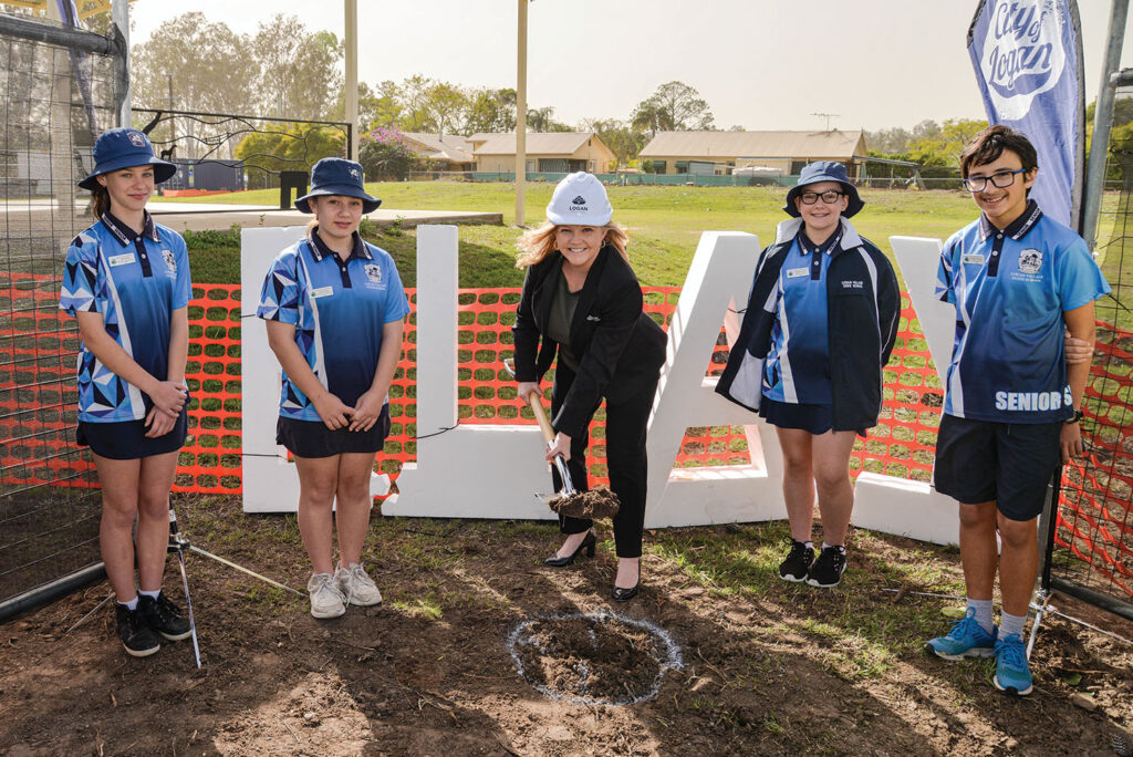 Logan City Councillor Laurie Koranski ‘turning the sod’