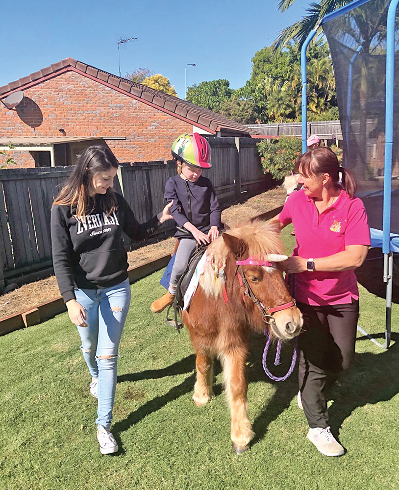 Mum Chenoa with Tovah on pony