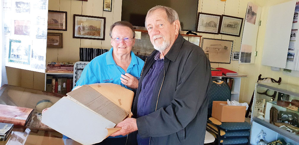 Graham Filkins presenting Book to Coralyn Cowin