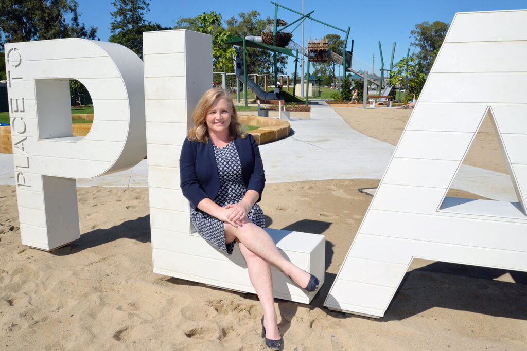 Cr Laurie Koranski and the new Logan Village Green Playground