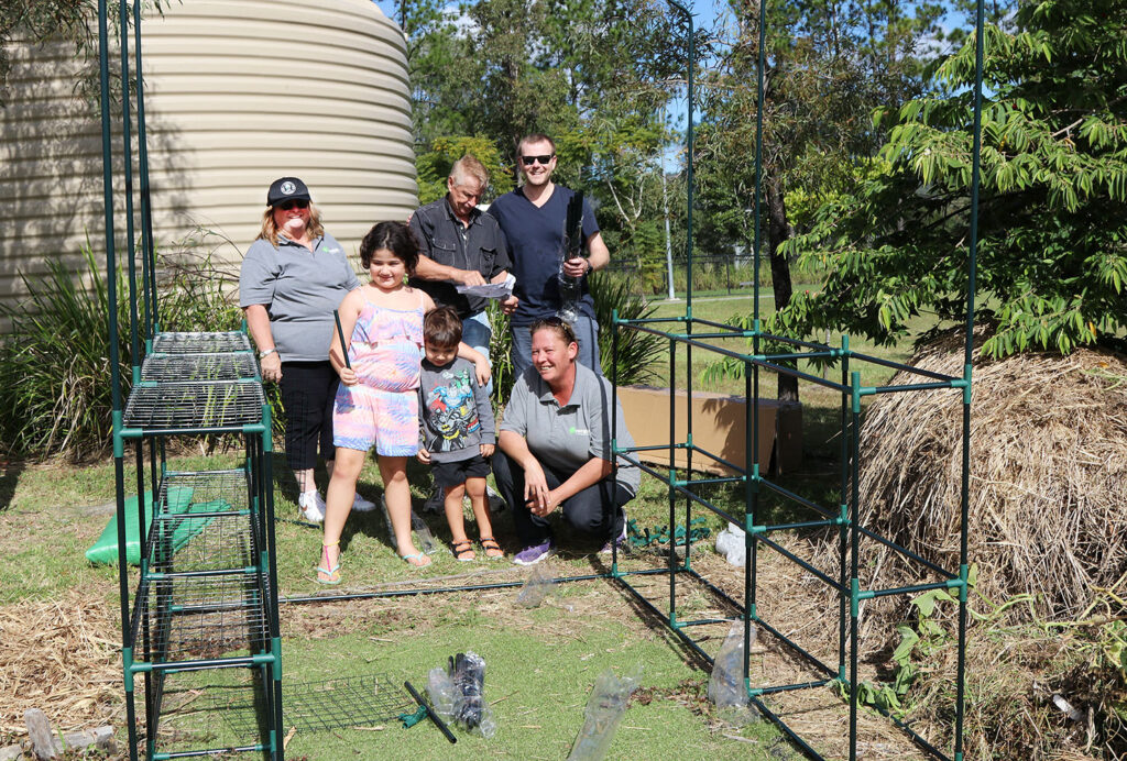 Building a greenhouse at the Gardens on Volunteers Day