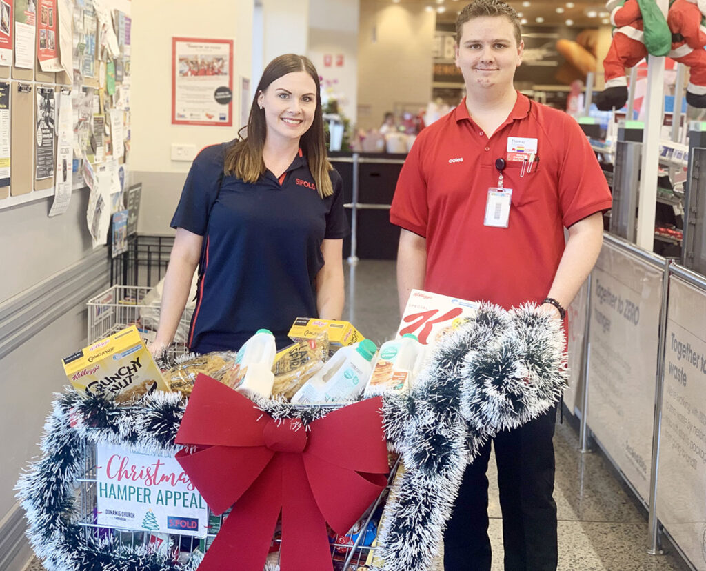 Mel & Thomas with the Donation Trolley at Coles