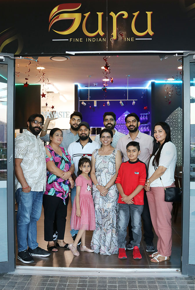 Guru Restaurant owner Uma Gaur with family and friends at official opening