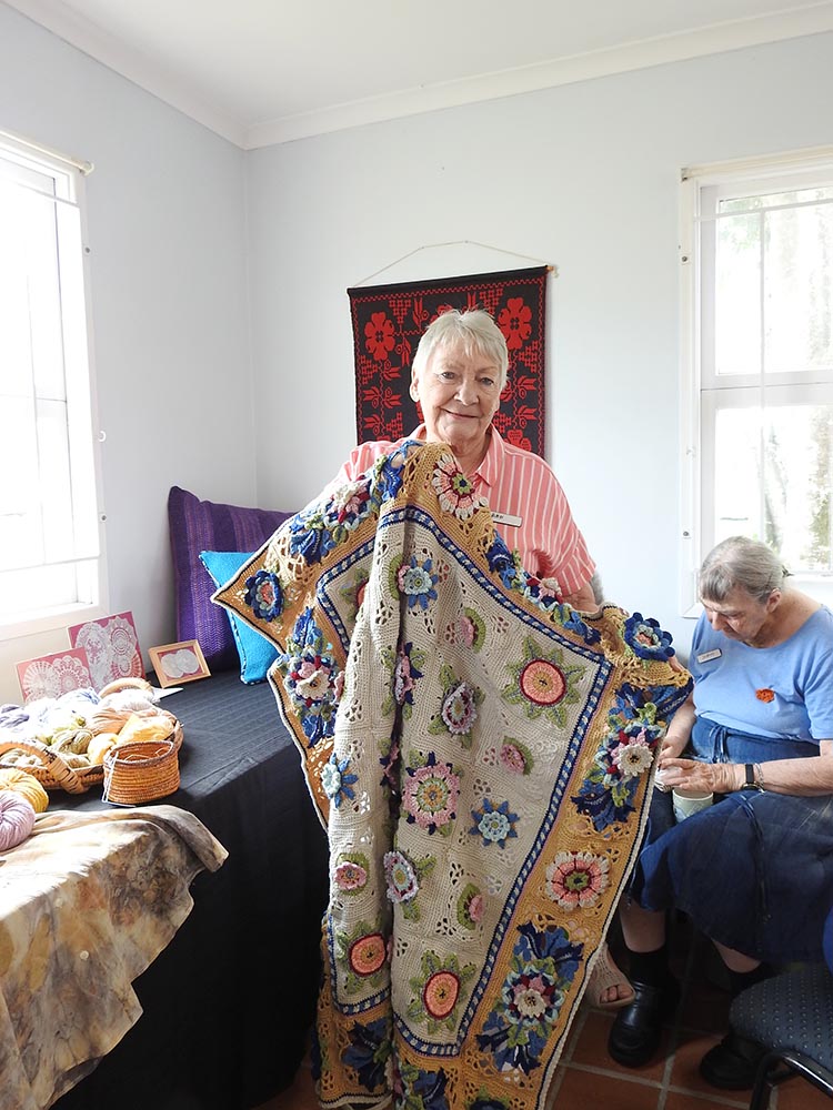 Anne with rug she crocheted